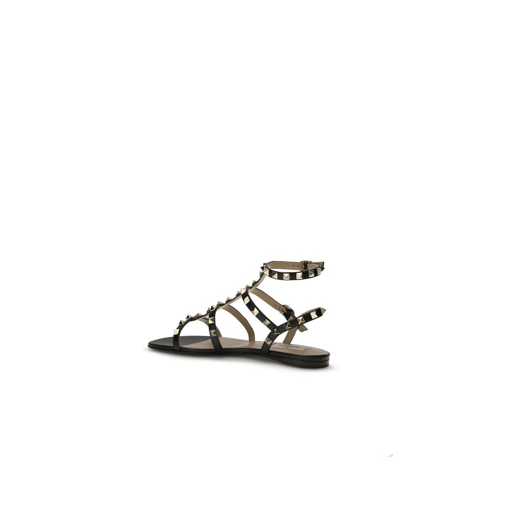 Valentino Garavani Black Calf Leather Bos Taurus Flat Sandals | Regal Royce
