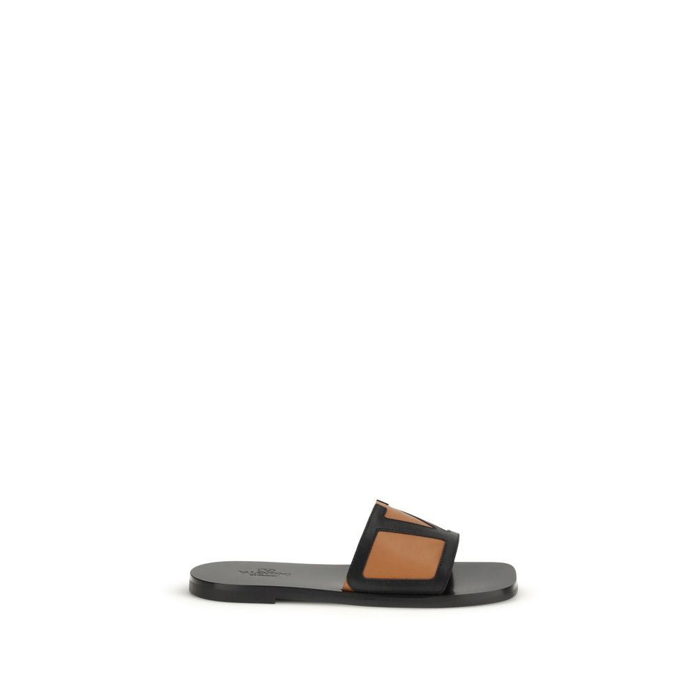Valentino Garavani Black Calf Leather Bos Taurus Flat Sandals | Regal Royce