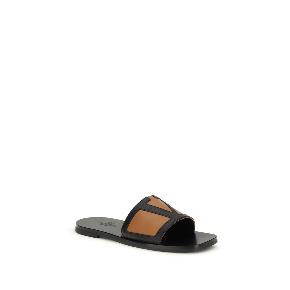 Valentino Garavani Black Calf Leather Bos Taurus Flat Sandals | Regal Royce