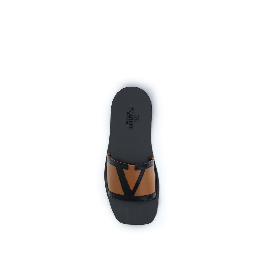 Valentino Garavani Black Calf Leather Bos Taurus Flat Sandals | Regal Royce