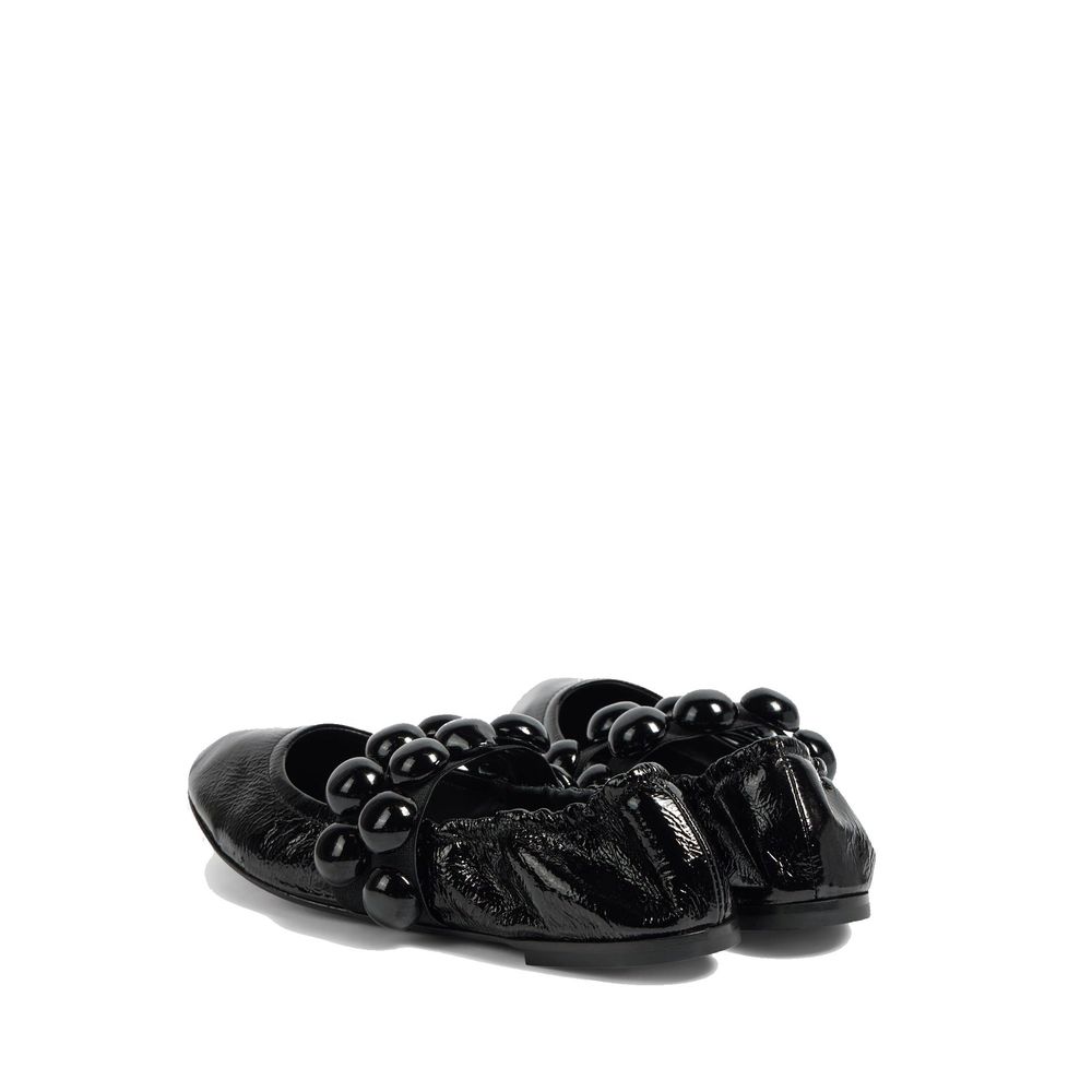Alaïa Black Calfskin Ballet Flats | Regal Royce