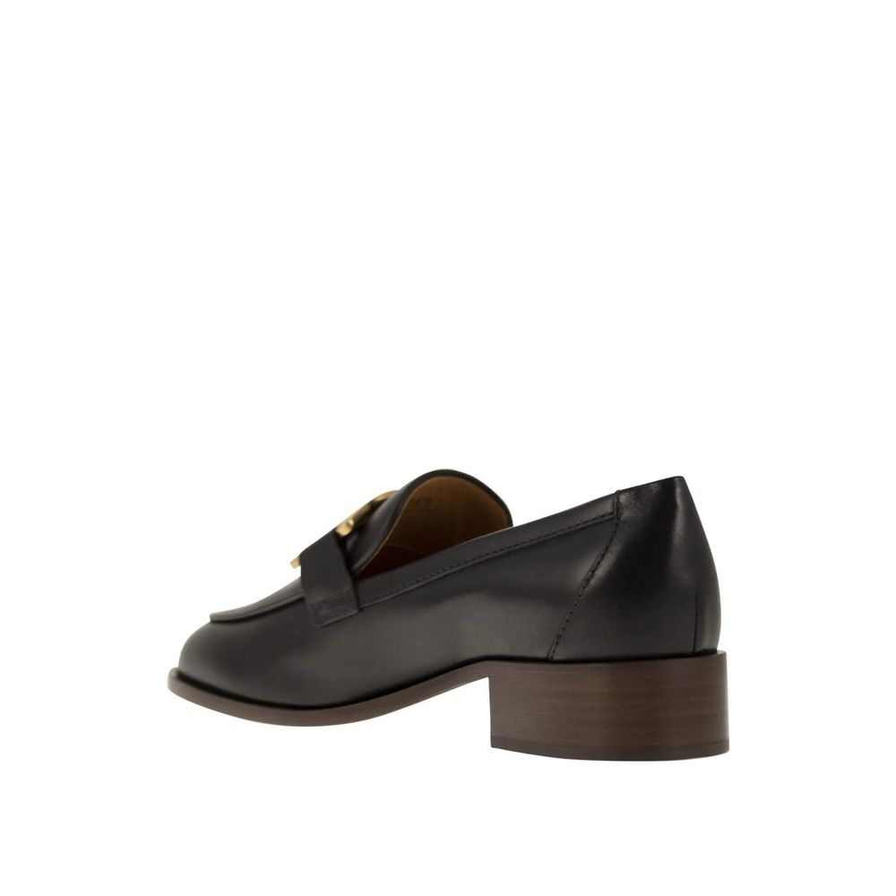 Tod's Black Calfskin Slip-On Loafers | Regal Royce