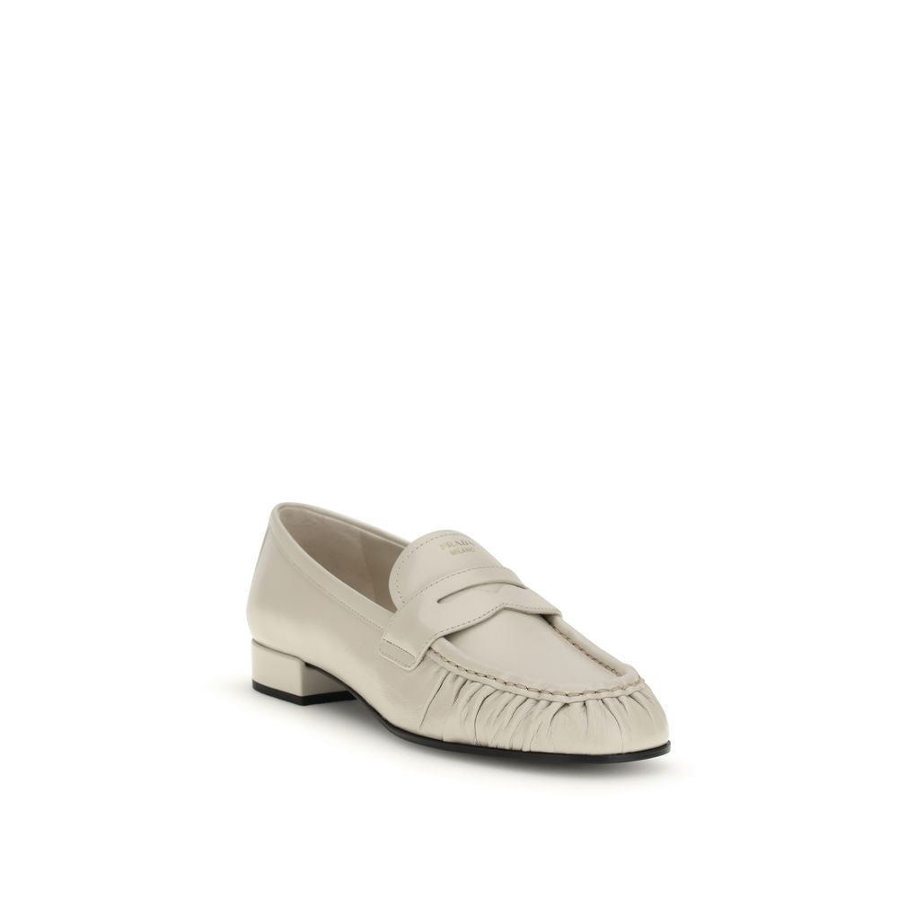 Prada Cream Calf Leather Bos Taurus Slip-On Loafers | Regal Royce