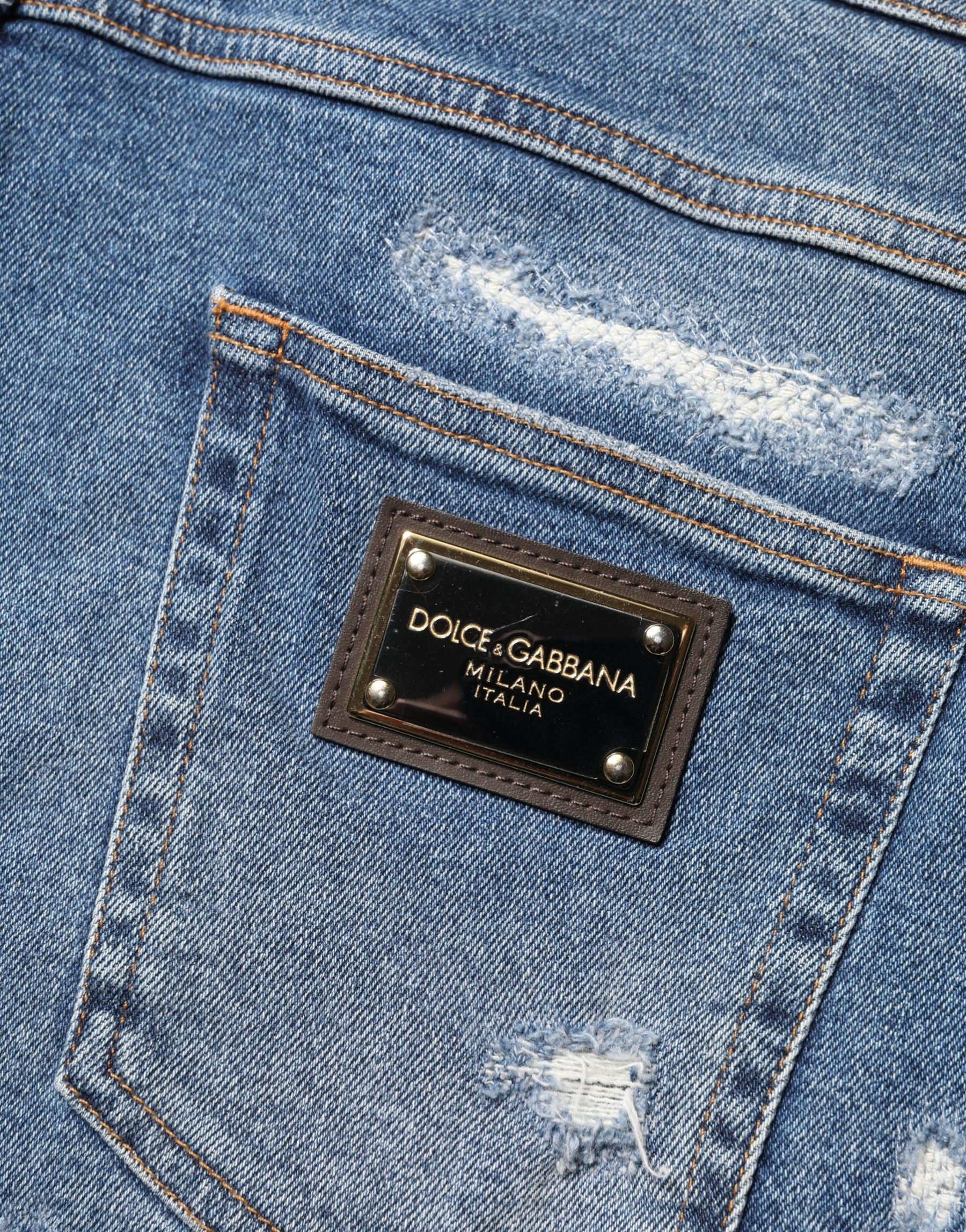 Dolce & Gabbana Blue Cotton Distressed Denim Bermuda Shorts | Regal Royce