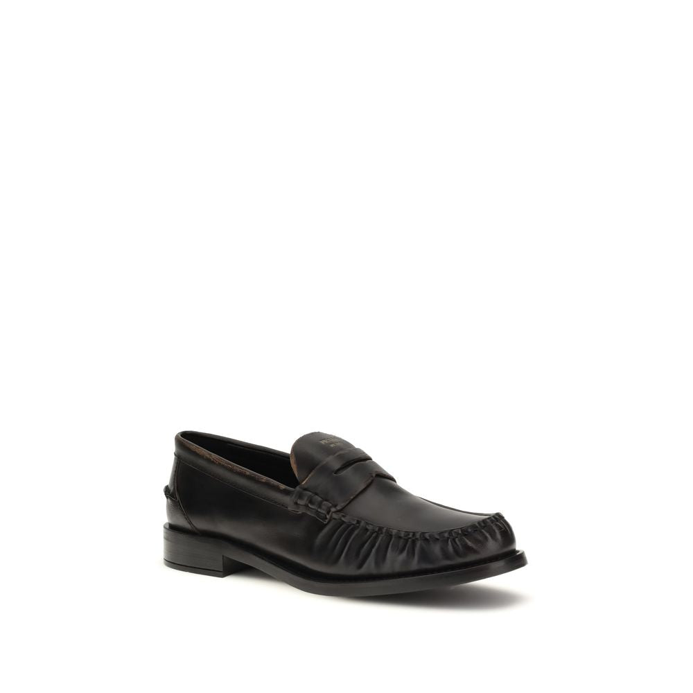Prada Black Calf Leather Bos Taurus Slip-On Loafers | Regal Royce