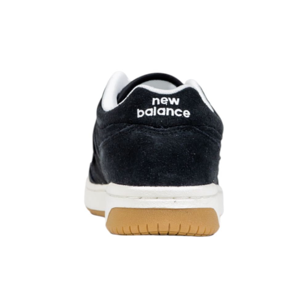 New Balance Black And White Leather Athletic Sneakers | Regal Royce