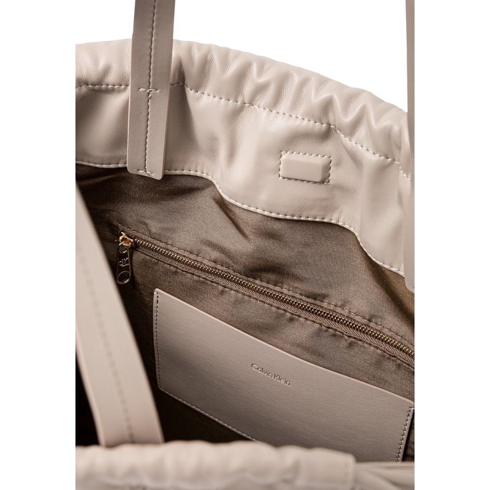 Calvin Klein Beige Polyethylene Handbag | Regal Royce