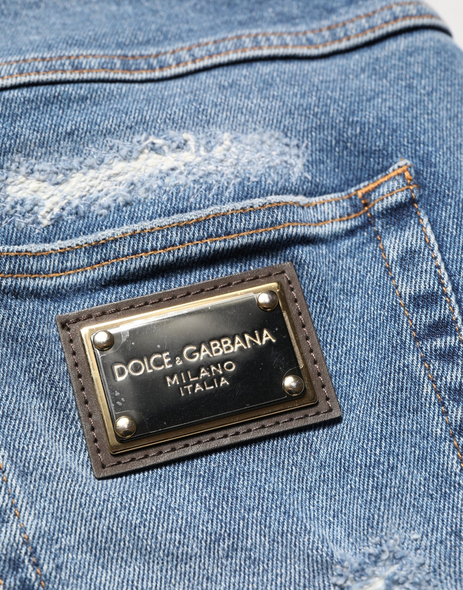 Dolce & Gabbana Blue Cotton Distressed Denim Bermuda Shorts | Regal Royce