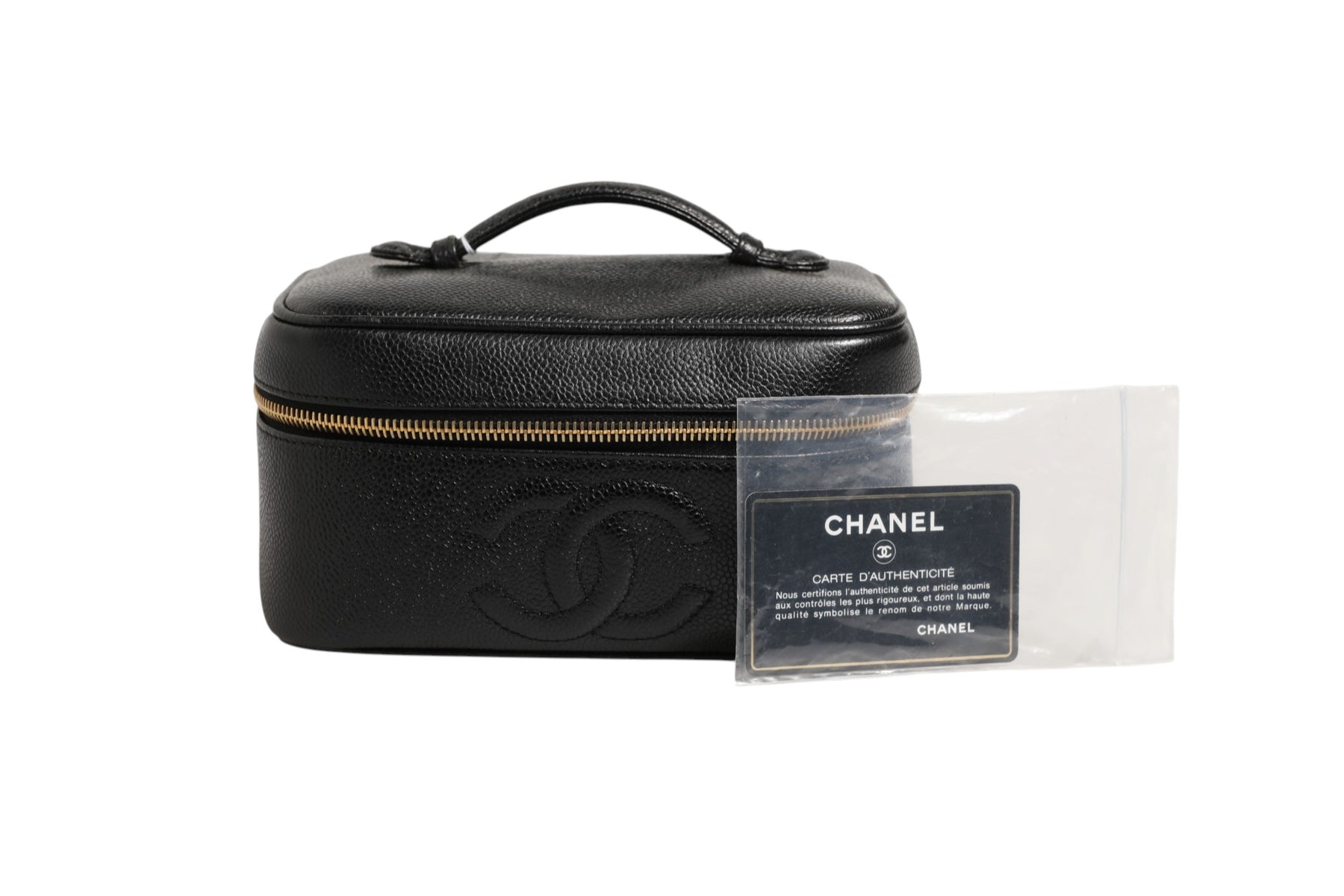 Chanel Black and gold makeup bag | Regal Royce