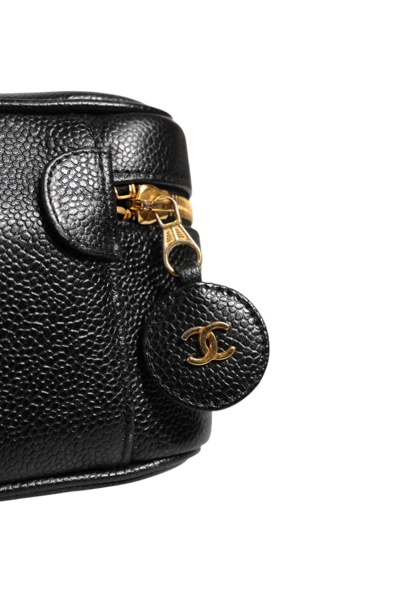 Chanel Black and gold makeup bag | Regal Royce