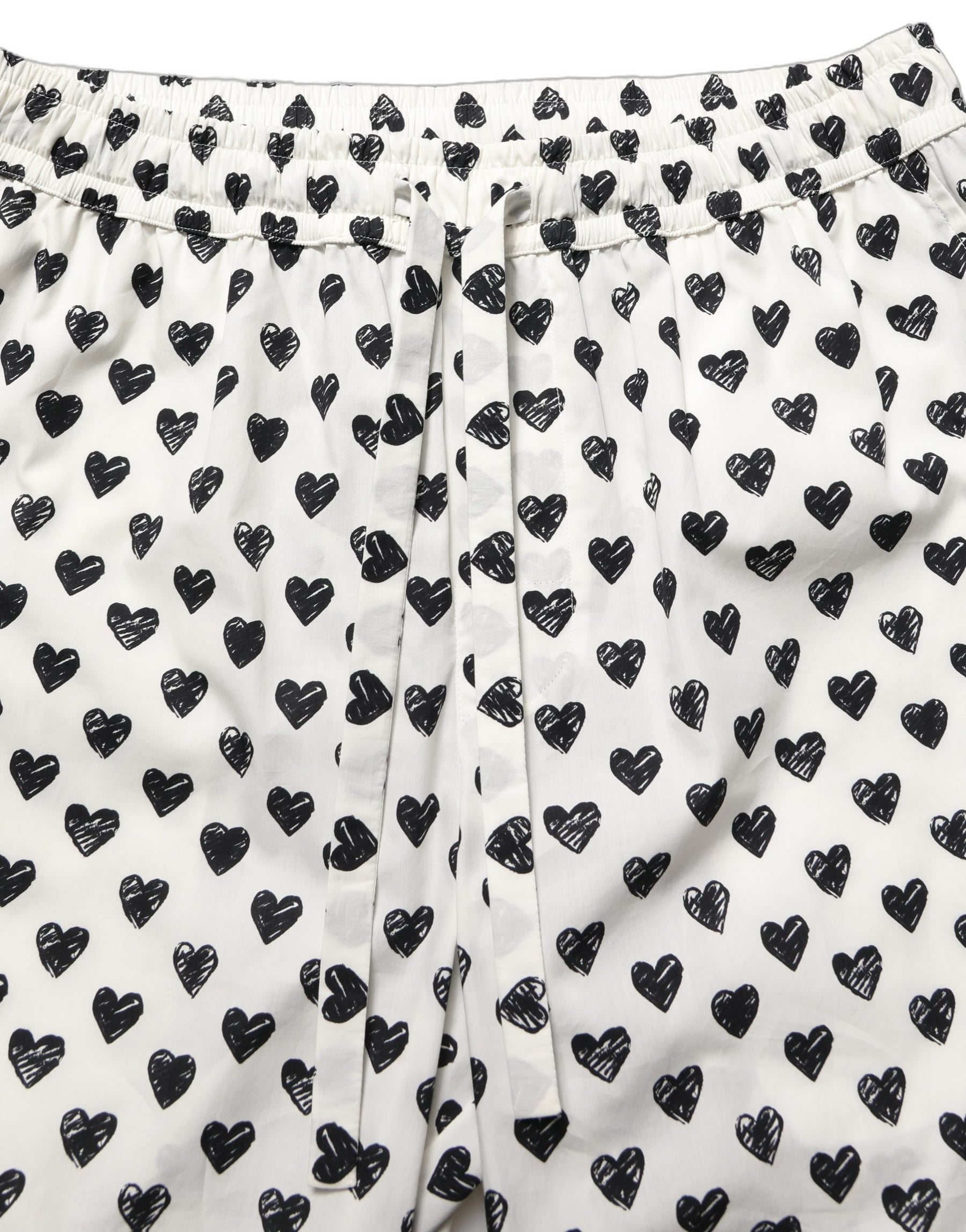 Dolce & Gabbana White Graphic Heart Print Men Trousers Pants | Regal Royce