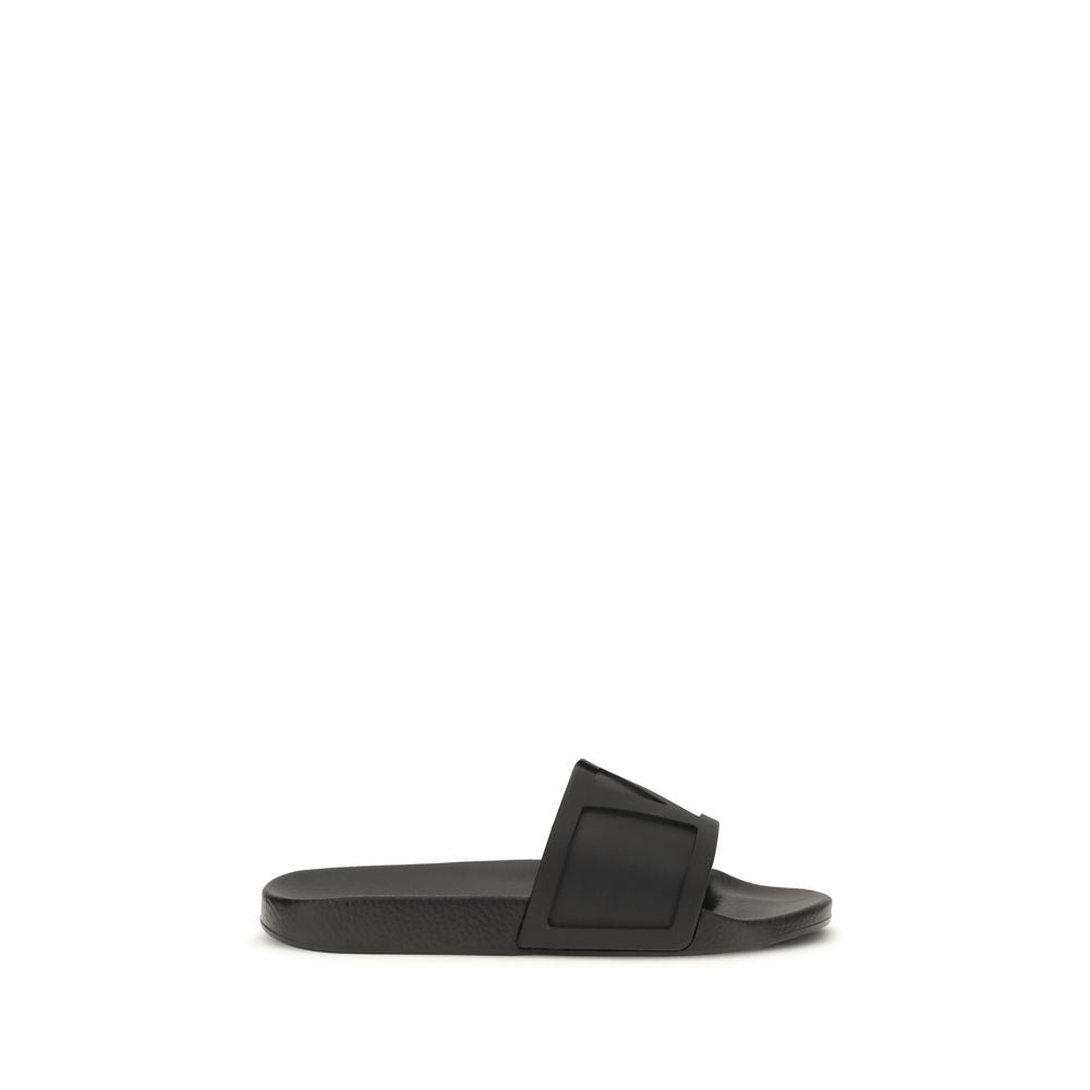 Valentino Garavani Black Rubber Flat Sandals | Regal Royce