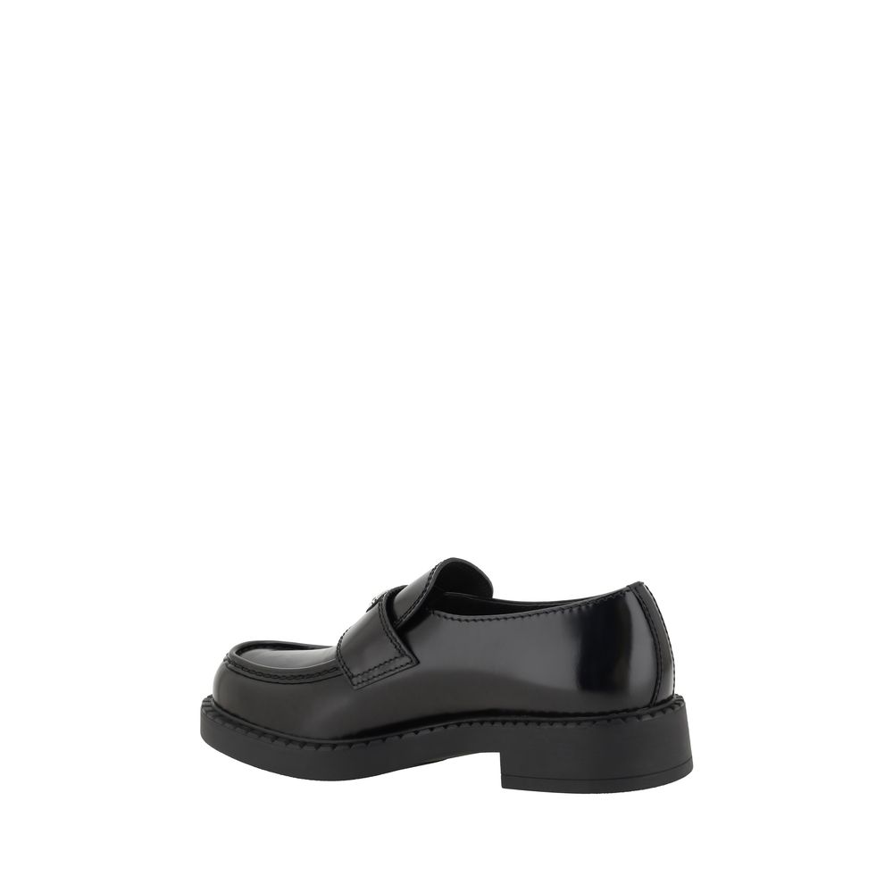 Prada Black Calf Leather Bos Taurus Platform Loafers | Regal Royce