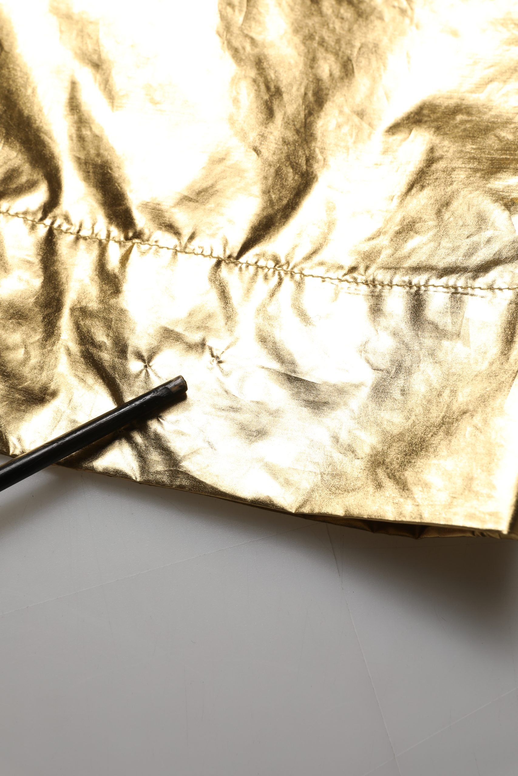 Dolce & Gabbana Metallic Gold High Waist Pleated Tapered Pants | Regal Royce