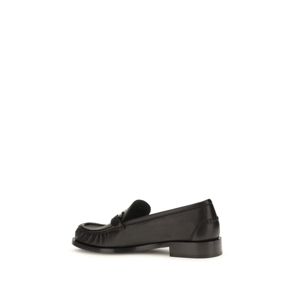 Ferragamo Black Calf Leather Bos Taurus Slip-On Loafers | Regal Royce