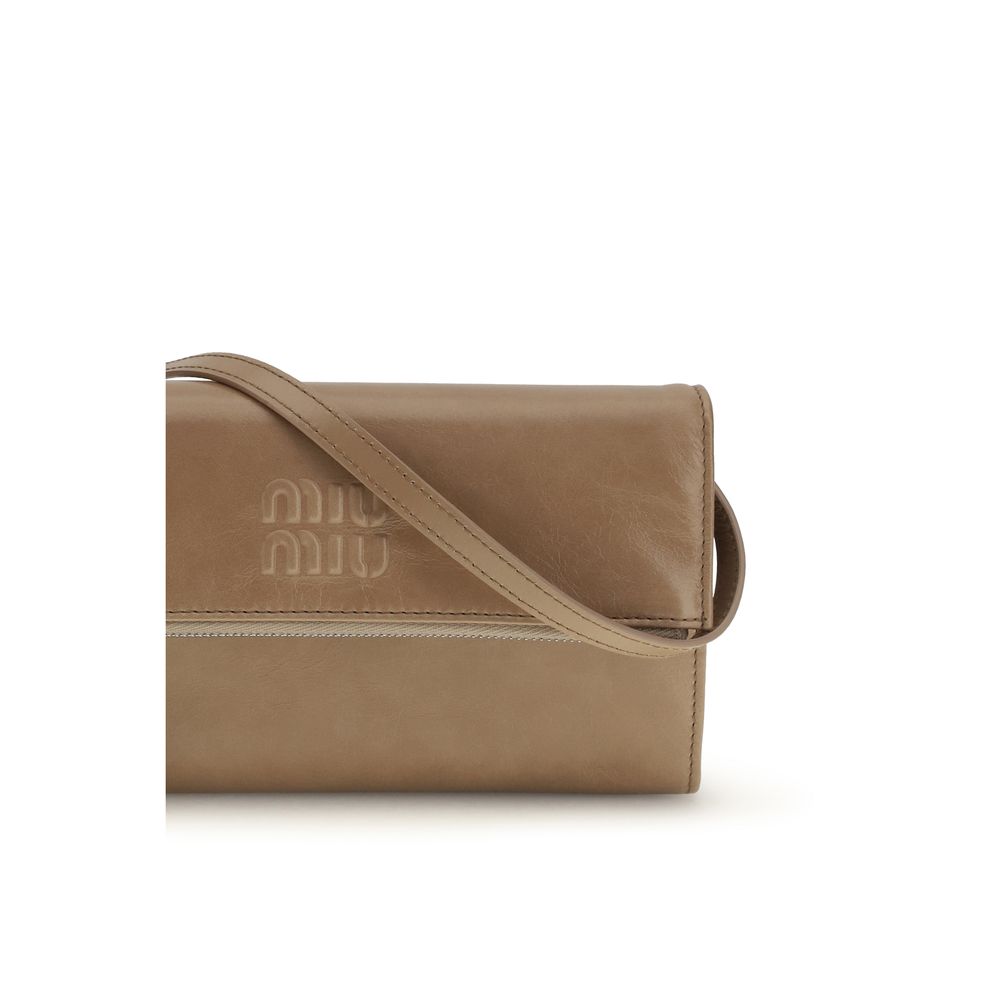 Miu Miu Beige Calf Leather Bos Taurus Clutch Bag | Regal Royce