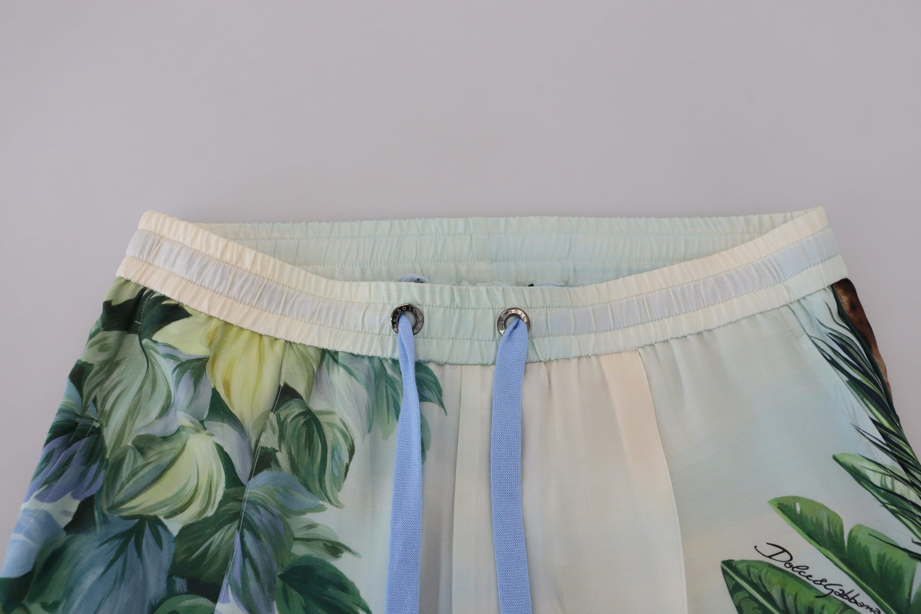 Dolce & Gabbana White Floral Printed Men Jogger Pants | Regal Royce