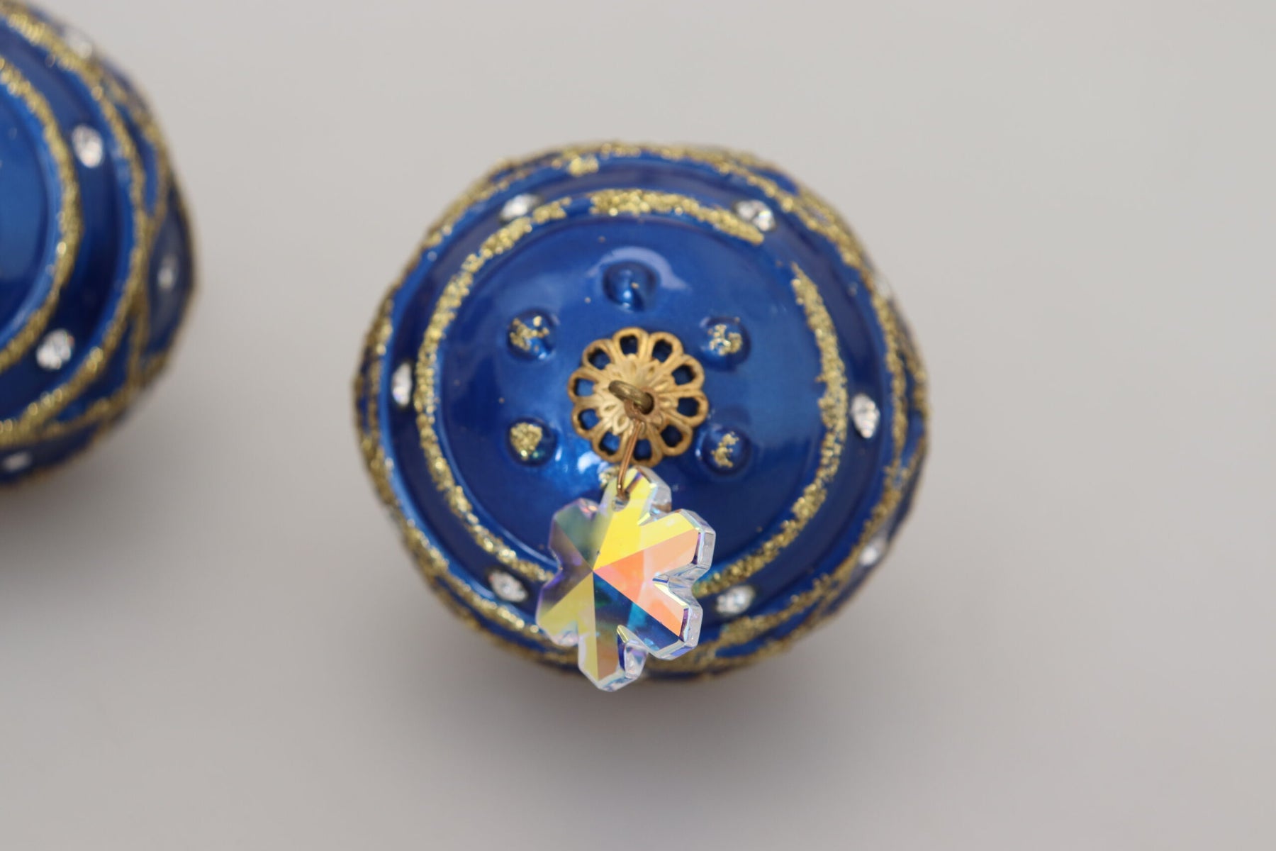 Dolce & Gabbana Gold Brass Blue Dangle Ball Crystal Clip On Earrings | Regal Royce