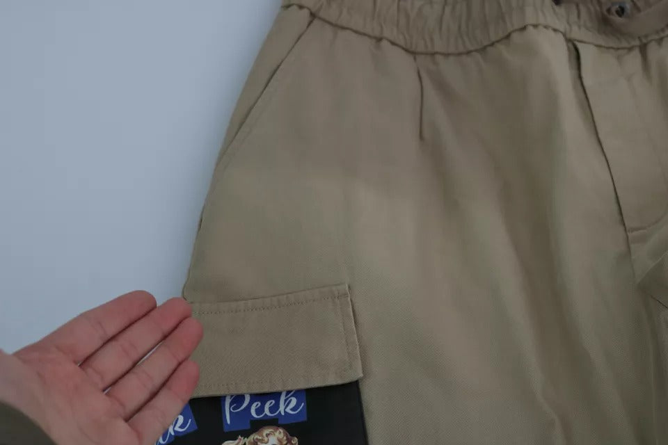 Dolce & Gabbana Beige Pin Up Print Cargo Pants | Regal Royce