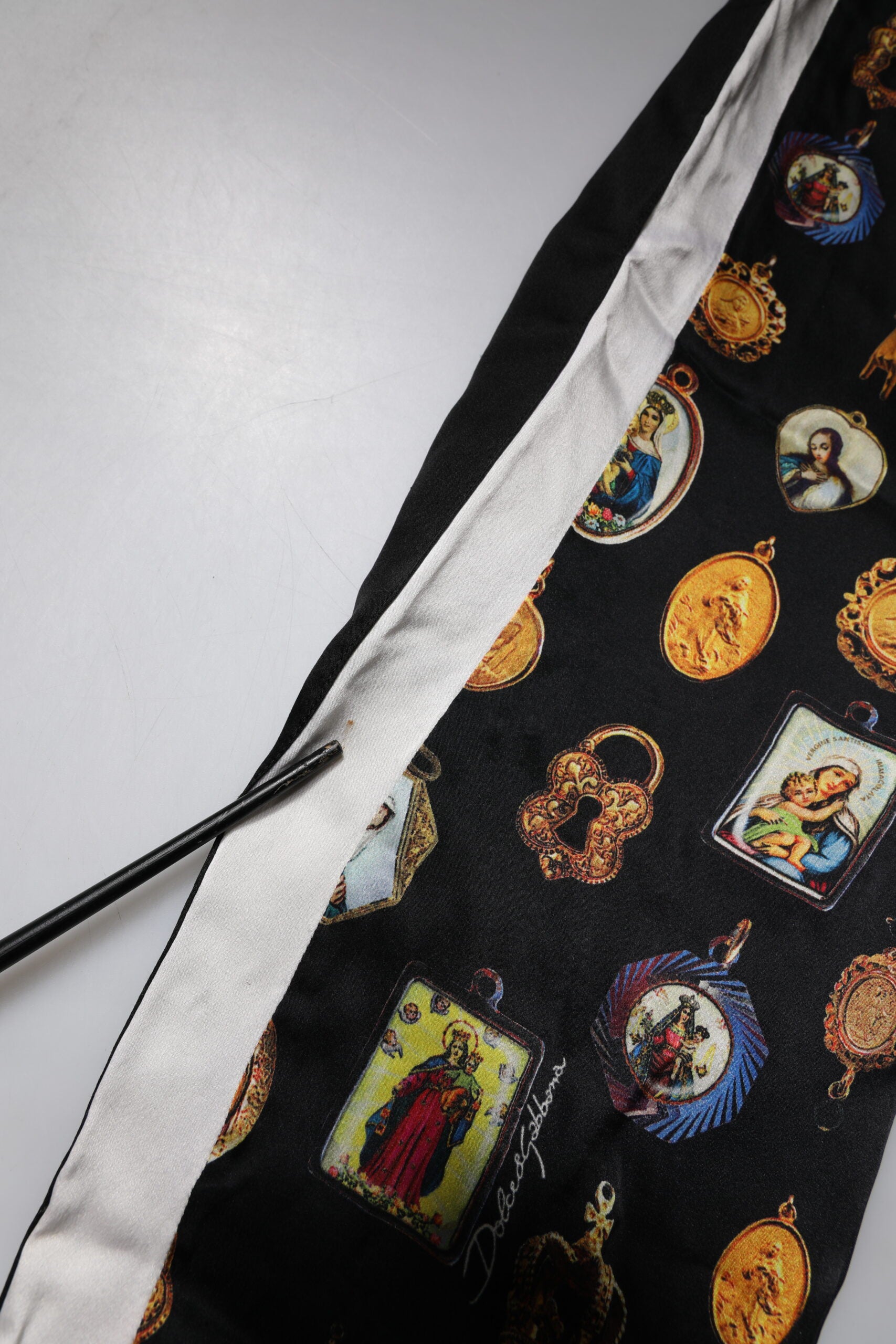 Dolce & Gabbana Black Religious Print Silk Men Jogger Pants | Regal Royce