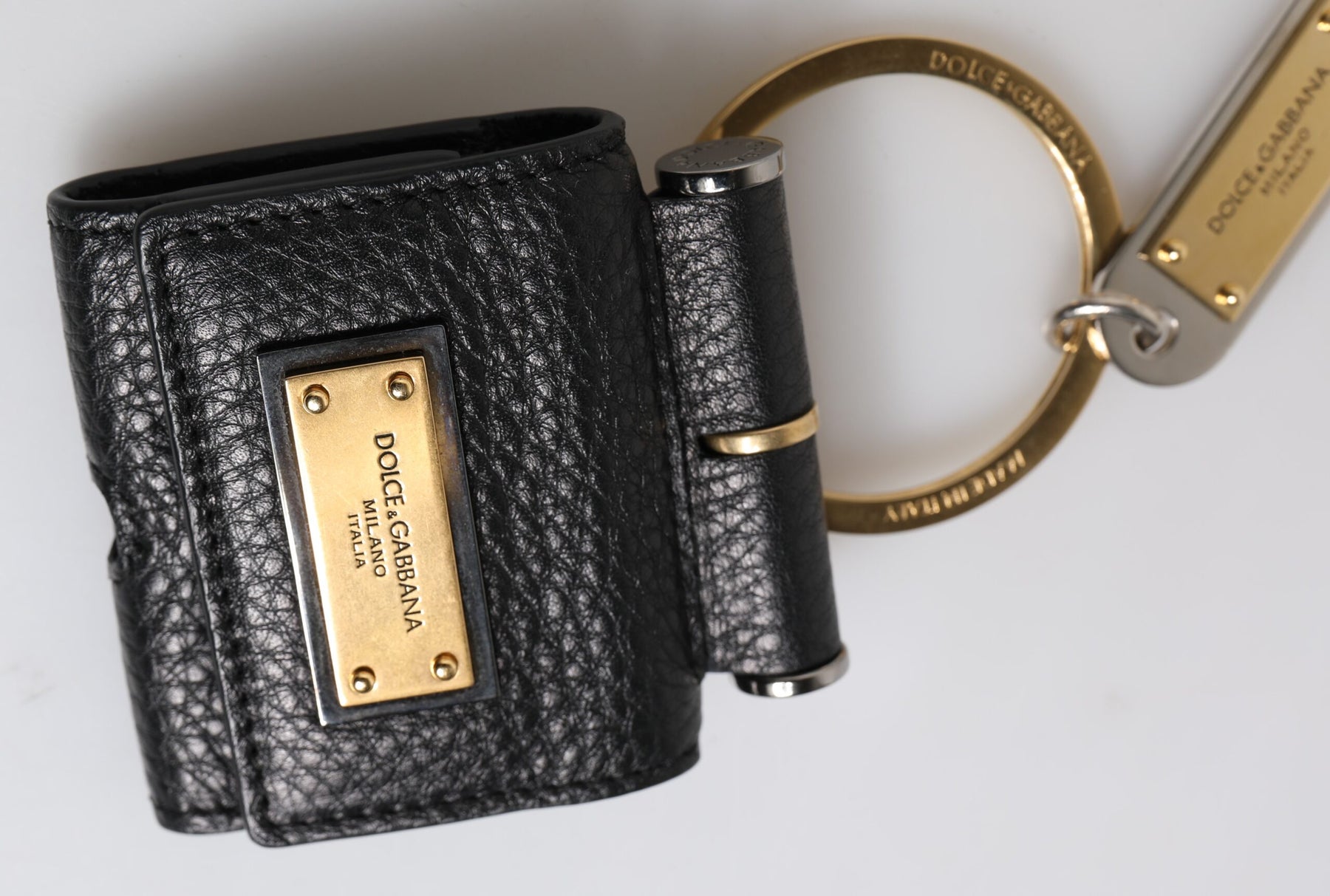 Dolce & Gabbana Black Leather Strap Gold Metal Logo Plaque Airpods Case | Regal Royce