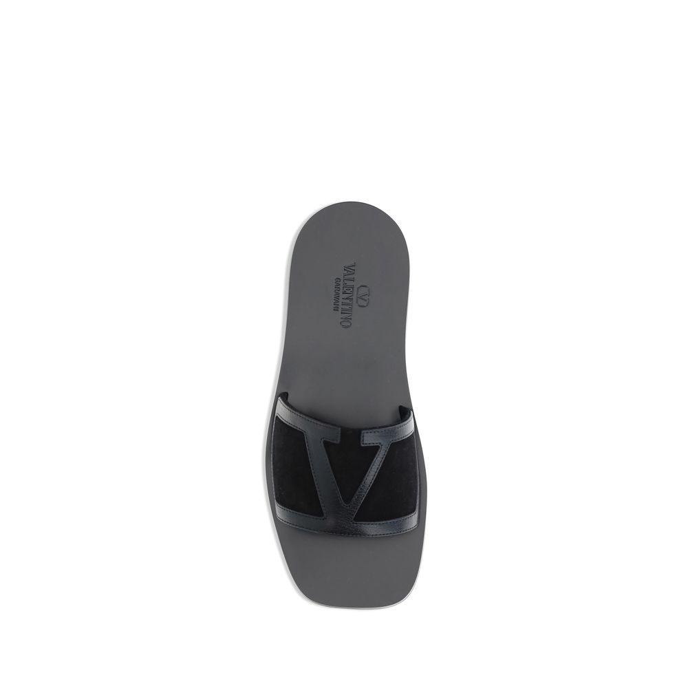 Valentino Garavani Black Calf Leather Bos Taurus Flat Sandals | Regal Royce