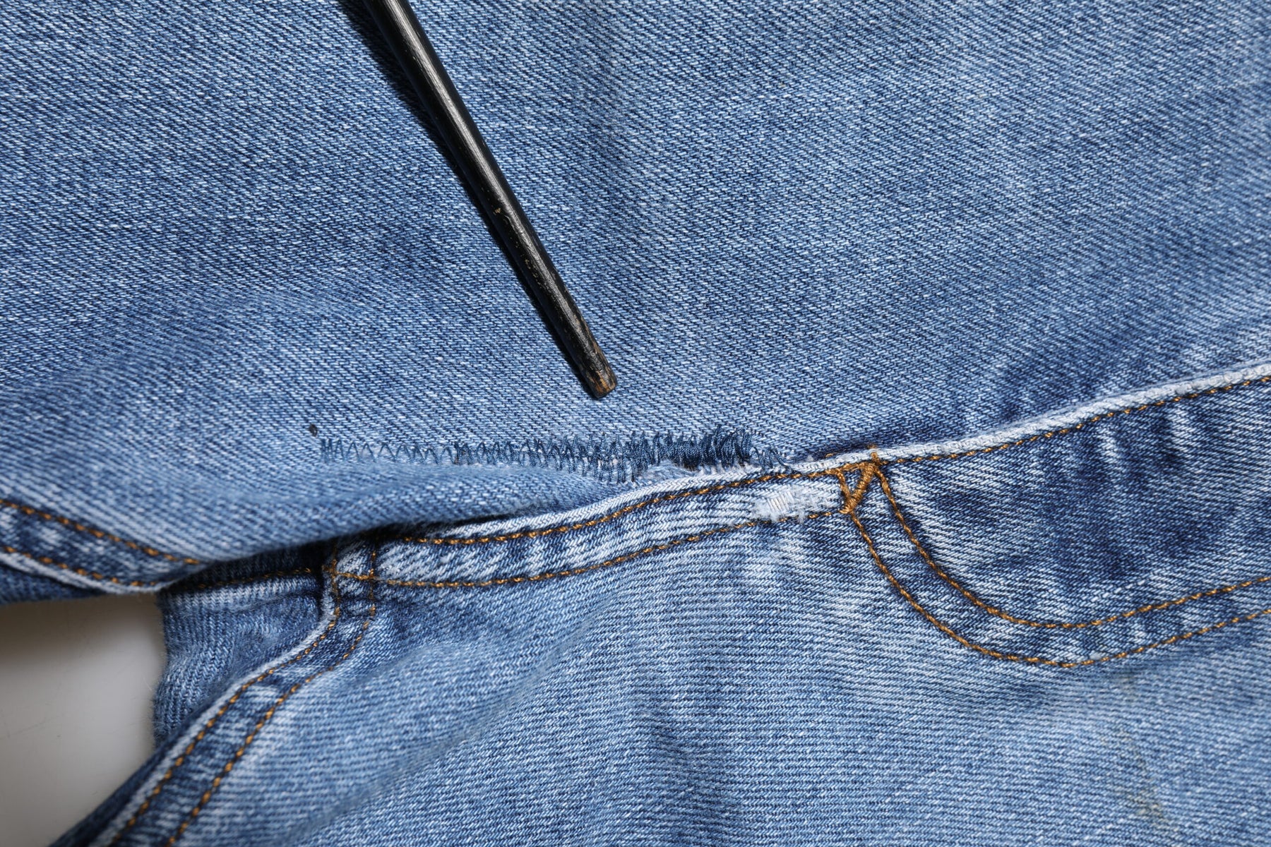 Dolce & Gabbana Blue Washed Tattered Logo Plaque Denim Jeans | Regal Royce