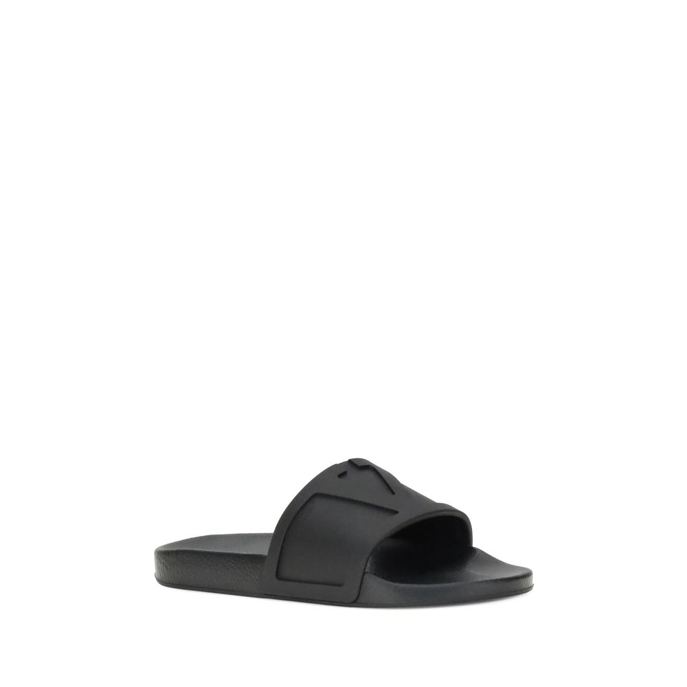 Valentino Garavani Black Rubber Flat Sandals | Regal Royce