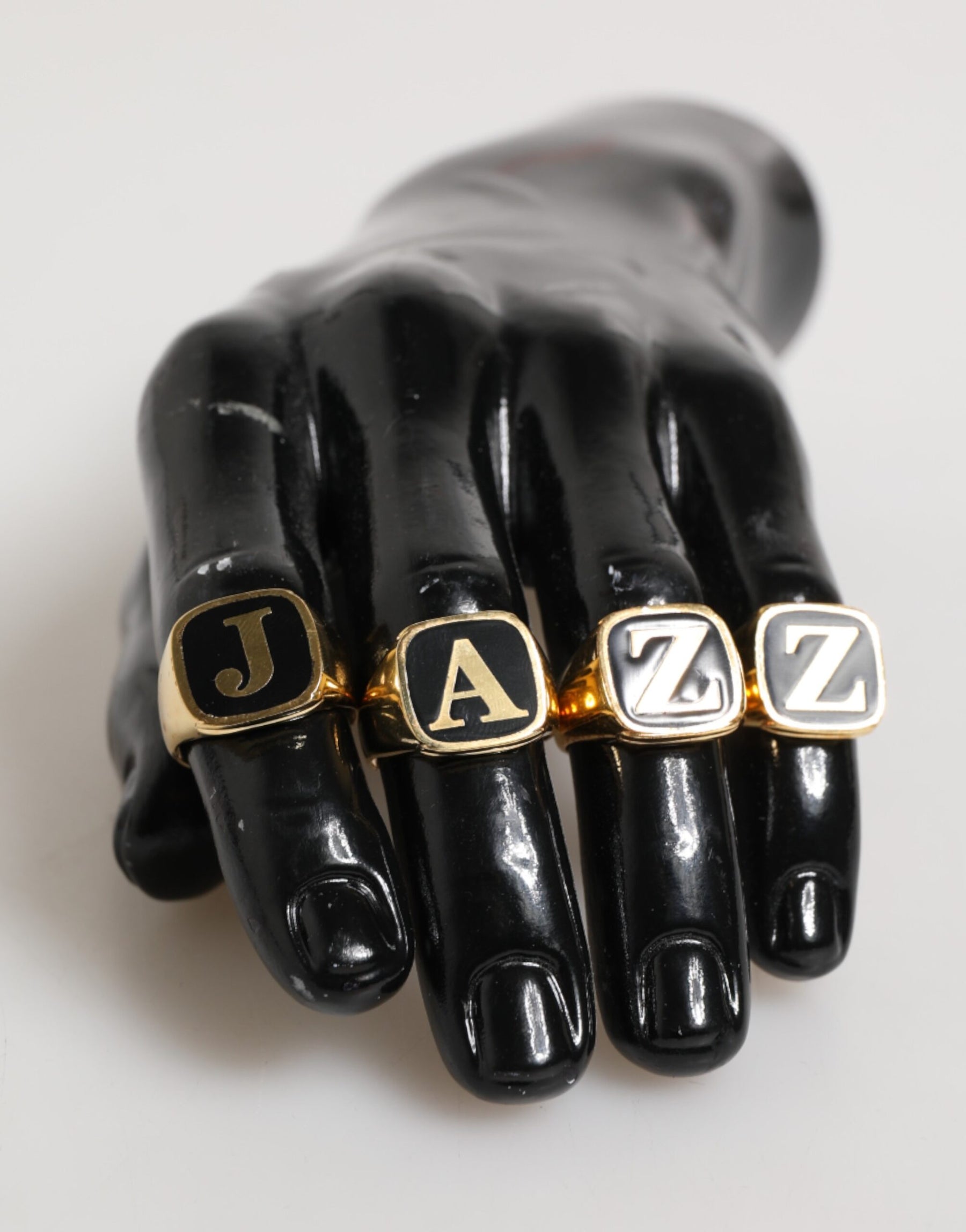 Dolce & Gabbana Gold Tone Brass JAZZ Letter Set 4 Pieces Adjustable Ring | Regal Royce