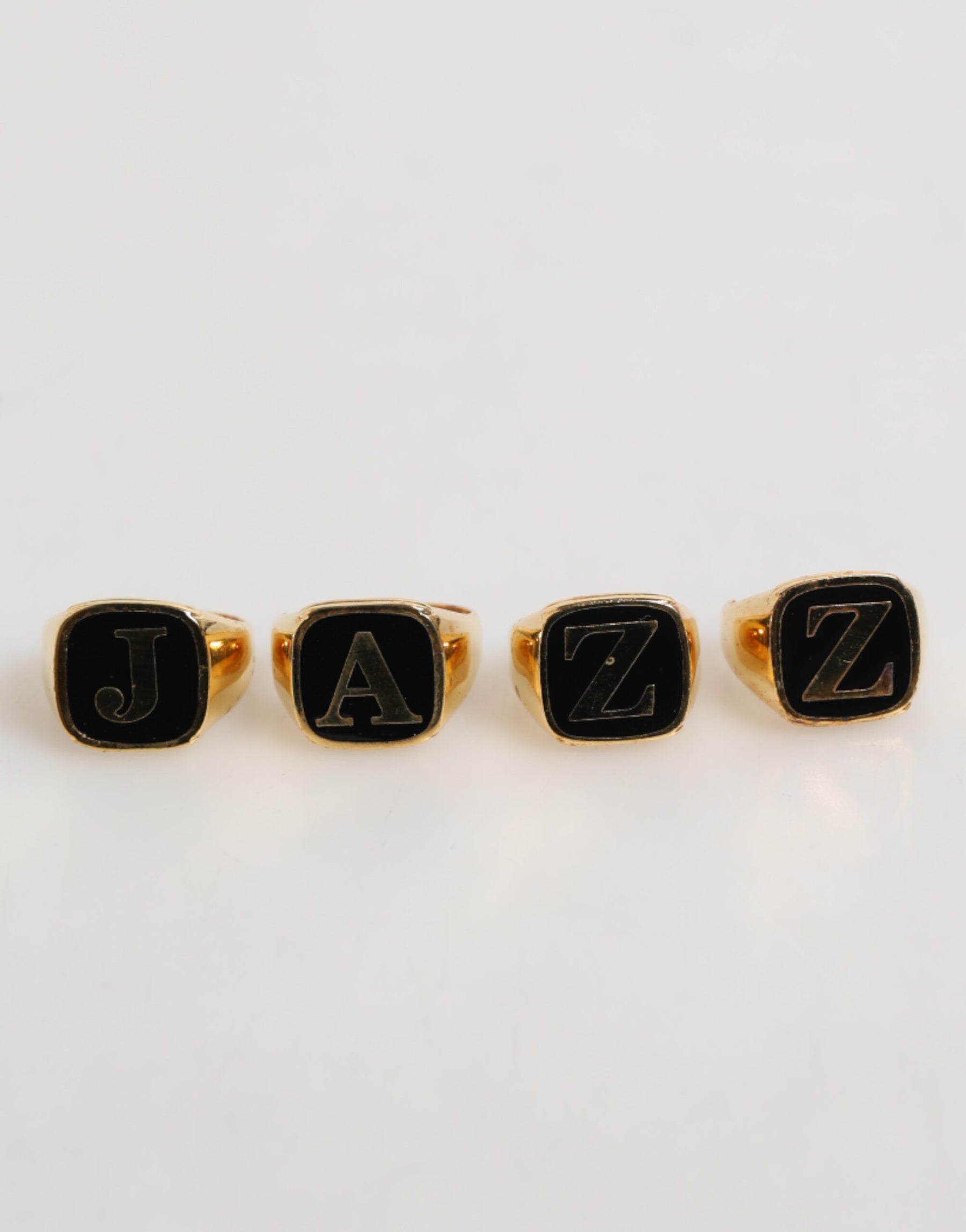 Dolce & Gabbana Gold Tone Brass JAZZ Letter Set 4 Pieces Adjustable Ring | Regal Royce