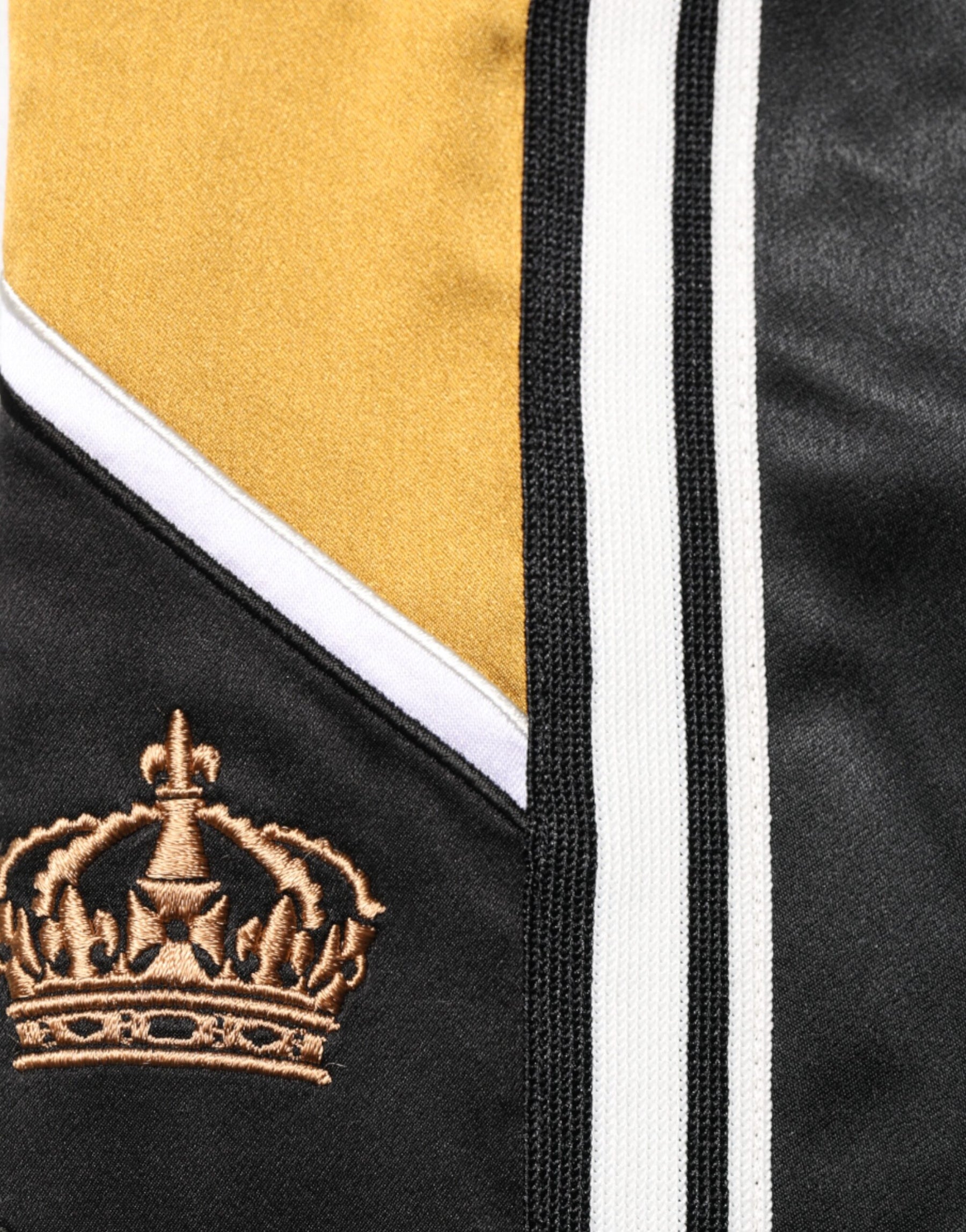 Dolce & Gabbana Black Gold Satin Crown Side Stripe Jogger Pants | Regal Royce