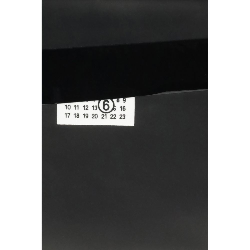 MM6 Black Calf Leather Bos Taurus Clutch Bag | Regal Royce