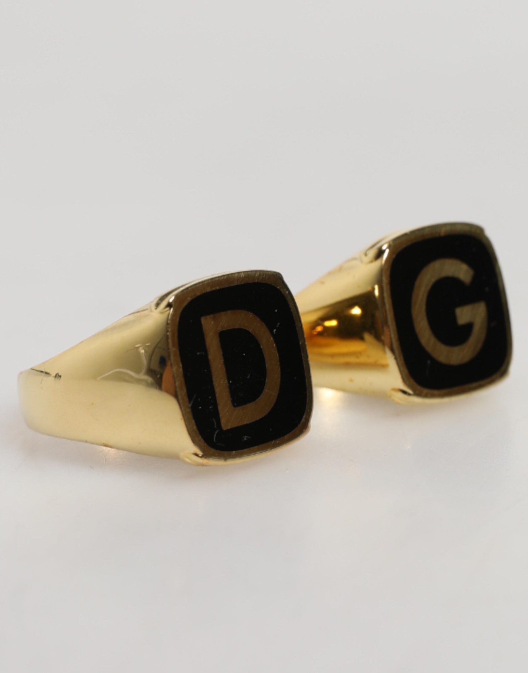 Dolce & Gabbana Gold-Tone Real Brass Black Enamel "DG" Adjustable Rings | Regal Royce