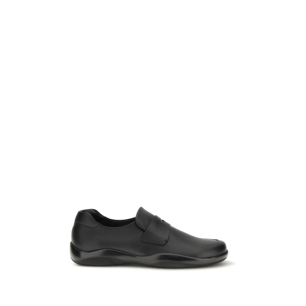 Prada Black Calf Leather Bos Taurus Slip-On Loafers | Regal Royce