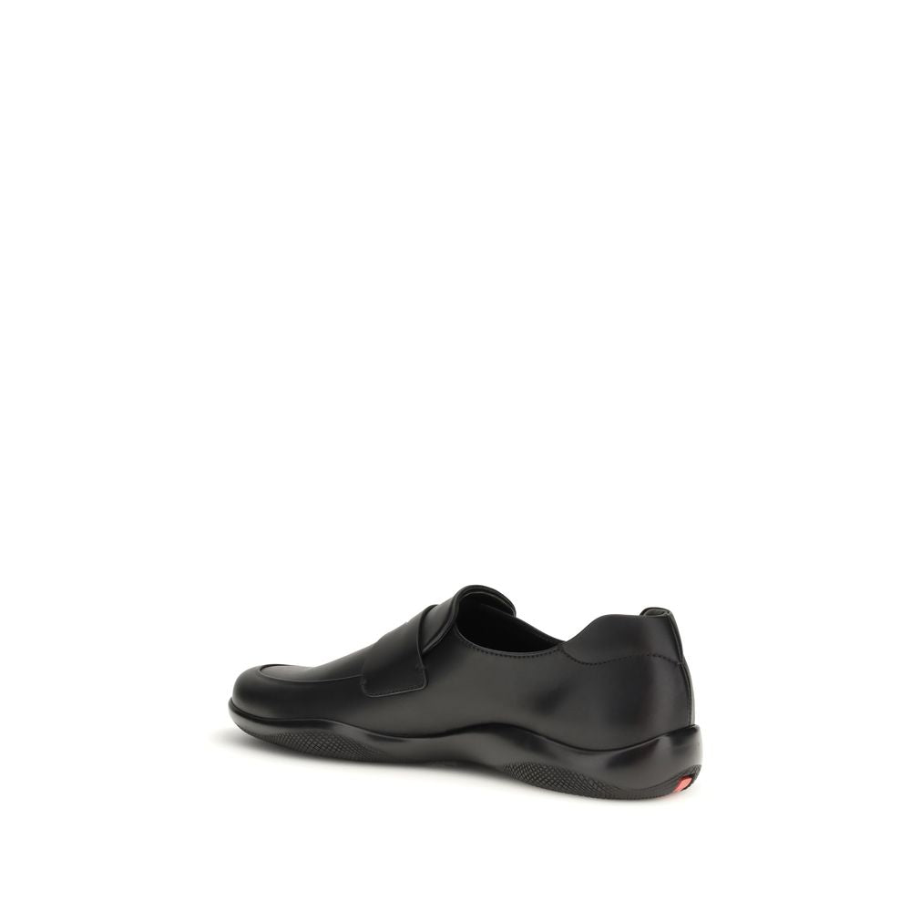 Prada Black Calf Leather Bos Taurus Slip-On Loafers | Regal Royce